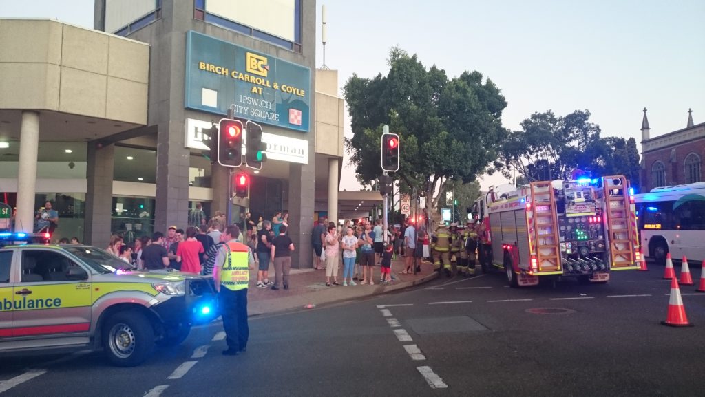 Emergency services and disappointed theatre-goers on Brisbane St on Friday night. Emergency services and disappointed theatre-goers on Brisbane St on Friday night.